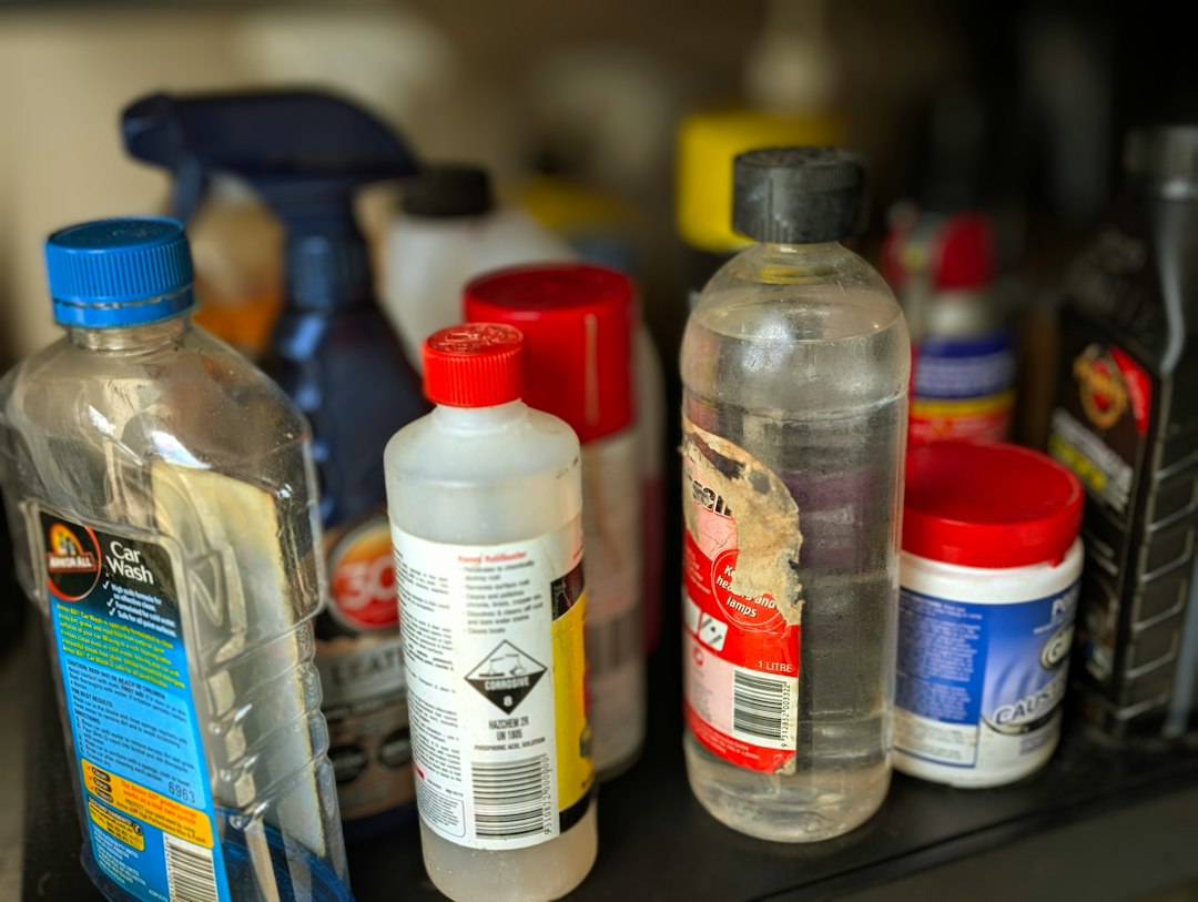 A bunch of bottles are sitting on a shelf